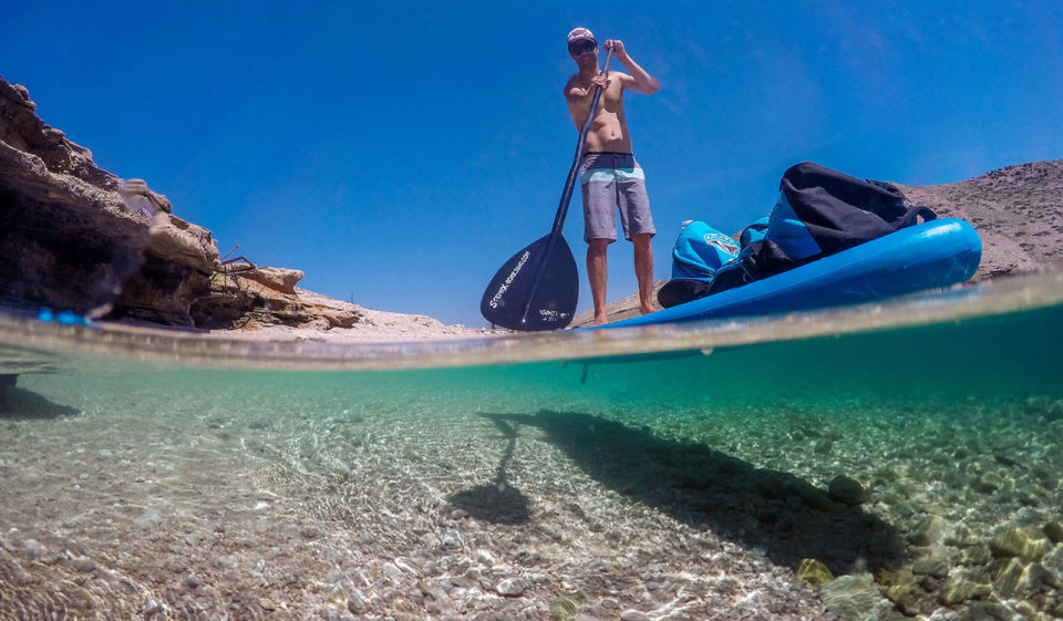 Stand up paddling half half photo